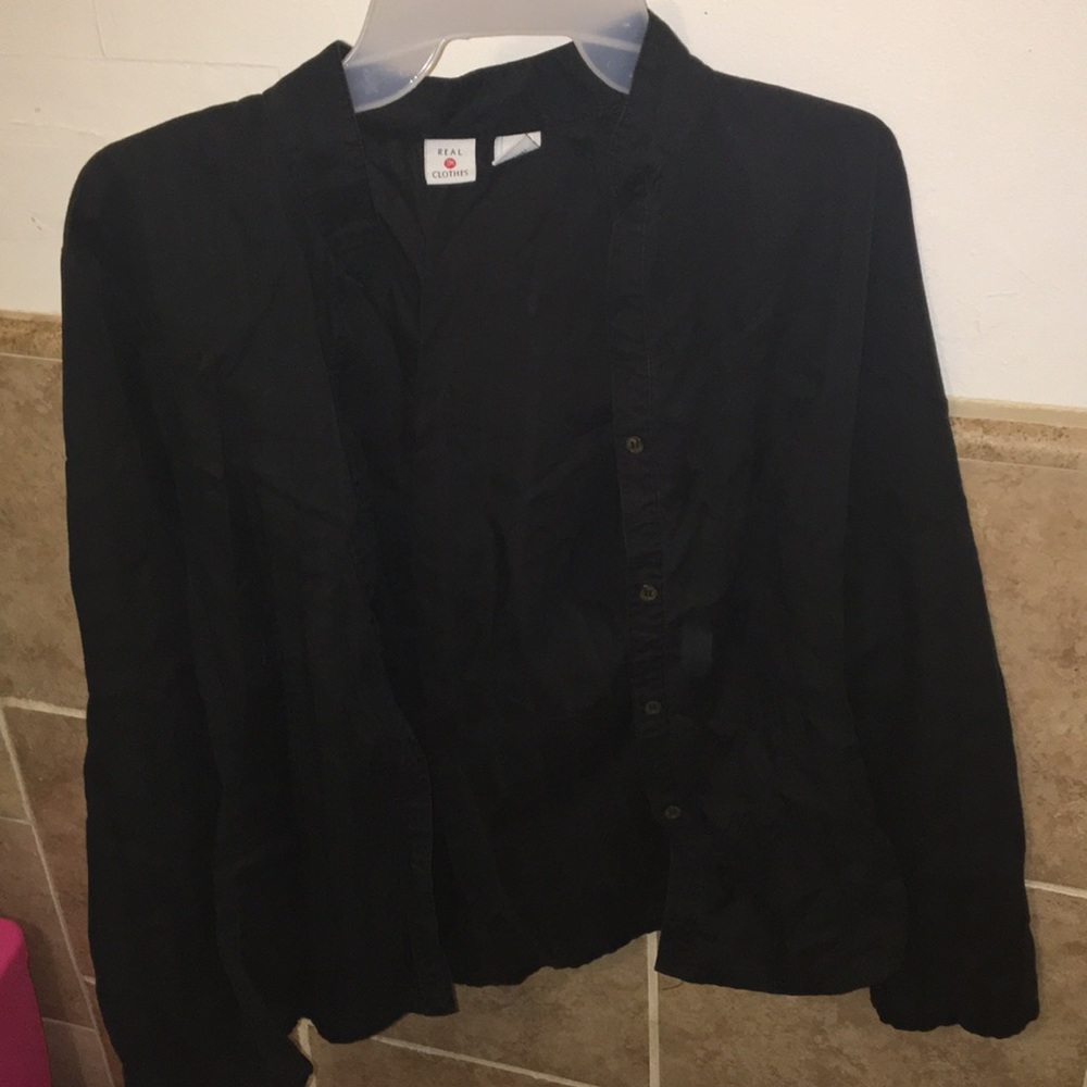 a buttoned black blouse